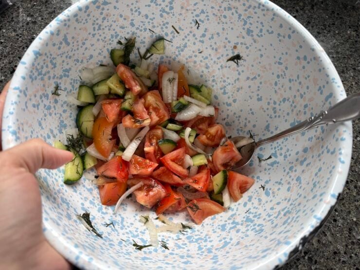 Image of a cucumber and tomato salad side for chicken Kotleti