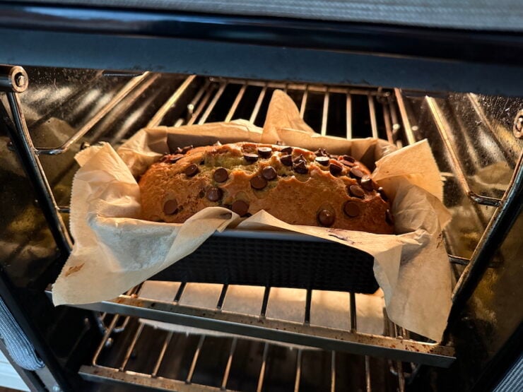 image of a perfectly baked chocolate chip banana bread (still in the oven)