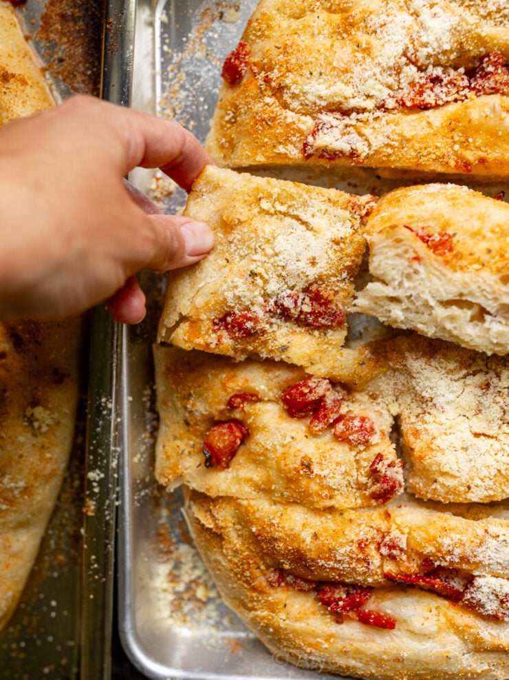 image of sliced tomato and parmesan focaccia bread