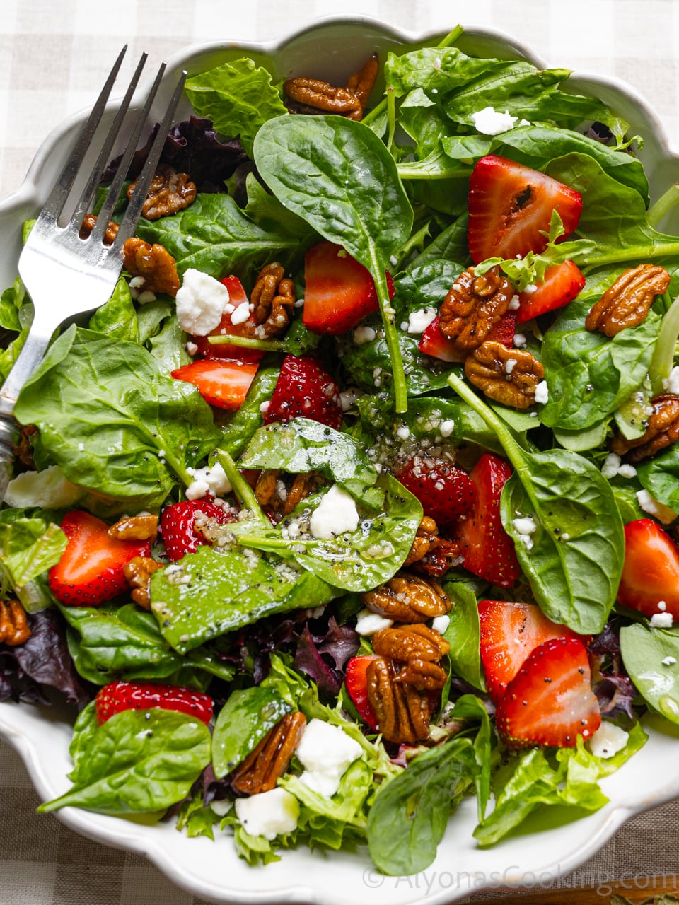 fresh strawberry spinach salad drizzled with sweet onion poppy seed dressing (amazing)!