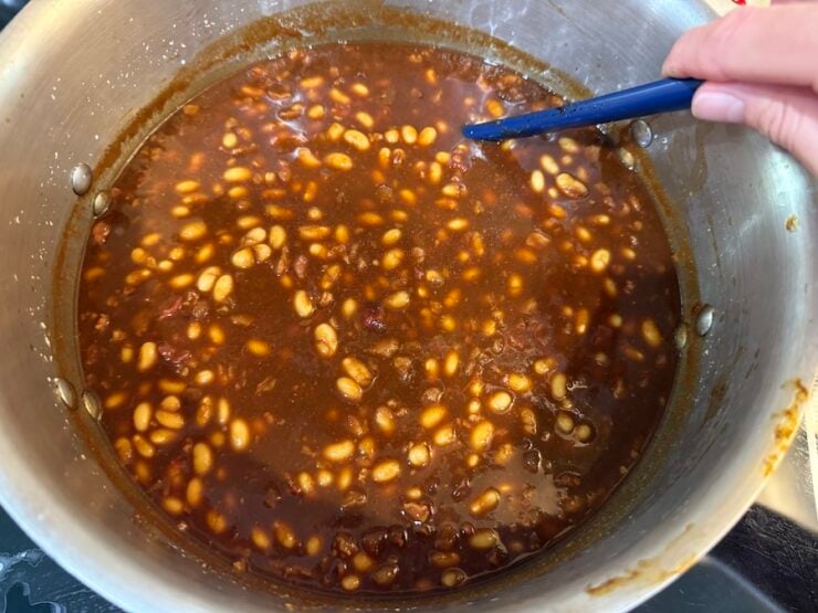 image of molasses coated navy beans ready to be canned