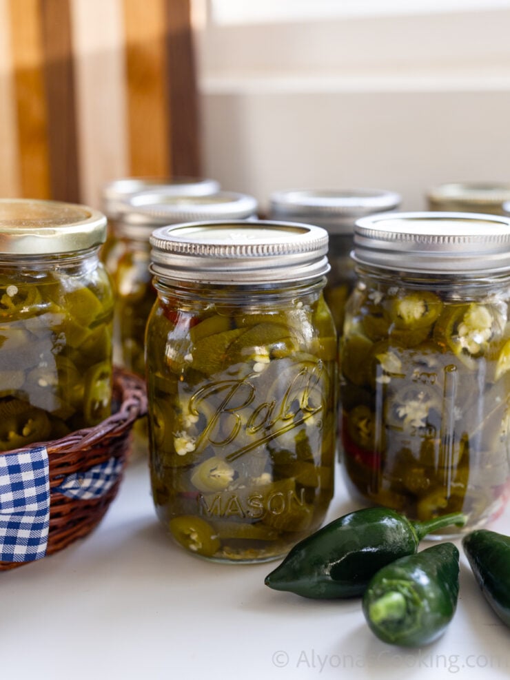 image of home canned pickled jalapeños in mason jars